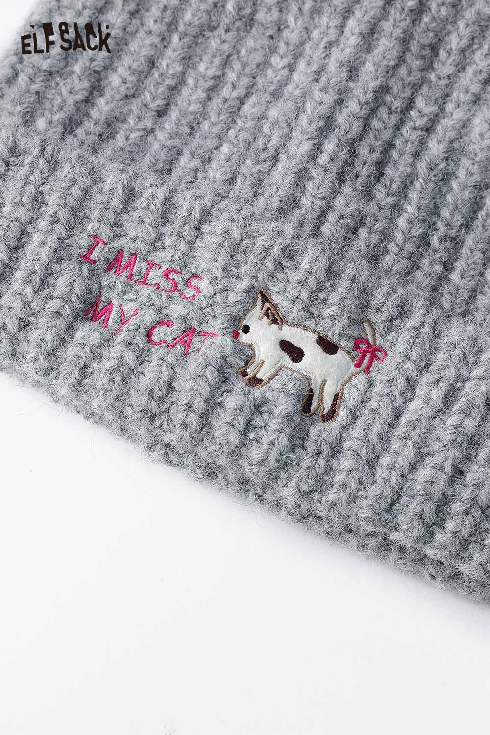 Cozy ELFSACK cat ear beanie for women in gray with playful dog embroidery and text