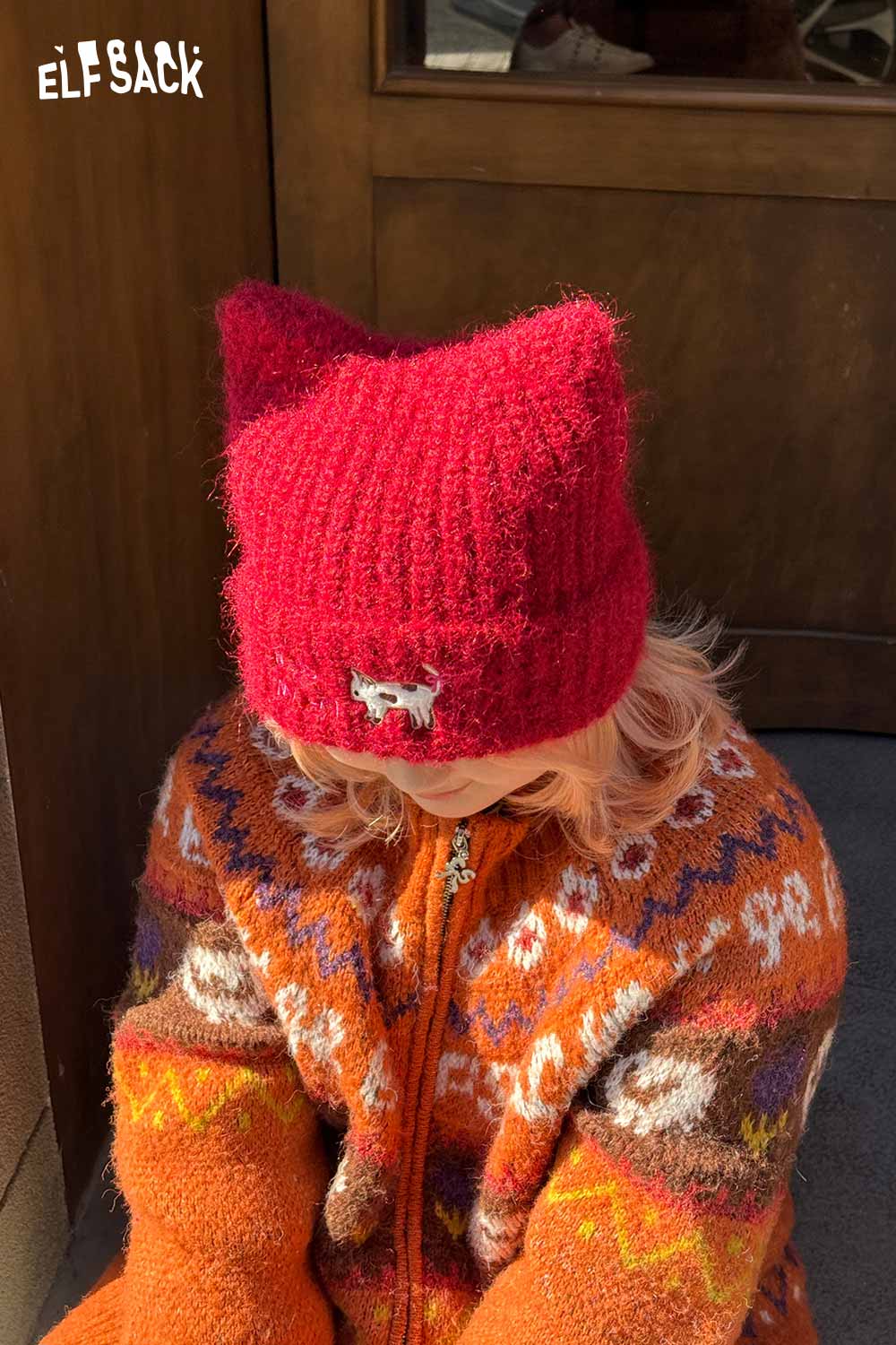Bright red cat ear beanie for women by ELFSACK, perfect for adding charm to winter outfits
