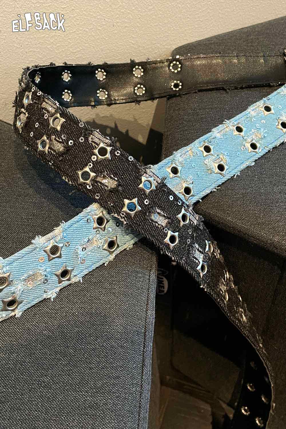 ELFSACK celestial motif leather belt for women featuring black and blue designs with star embellishments