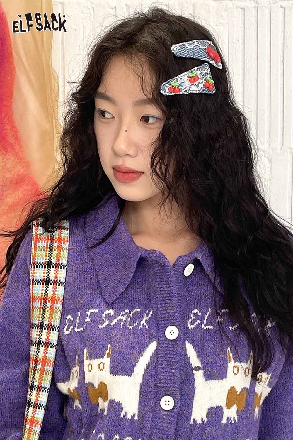 ELFSACK cherry motif hair clip displayed in a model's wavy hair for a stylish look