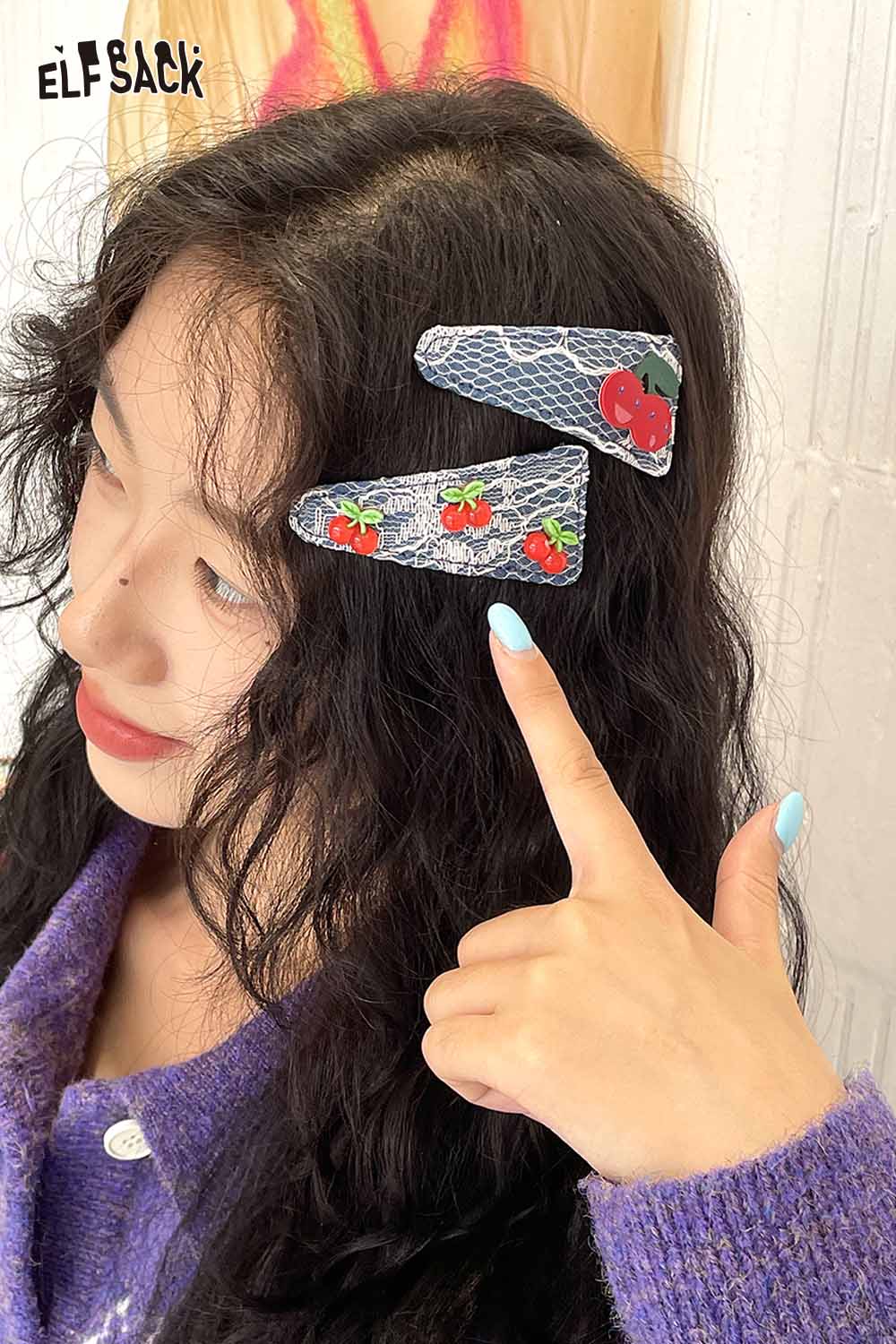 ELFSACK cherry motif hair clip set featuring a playful design on a model's hair