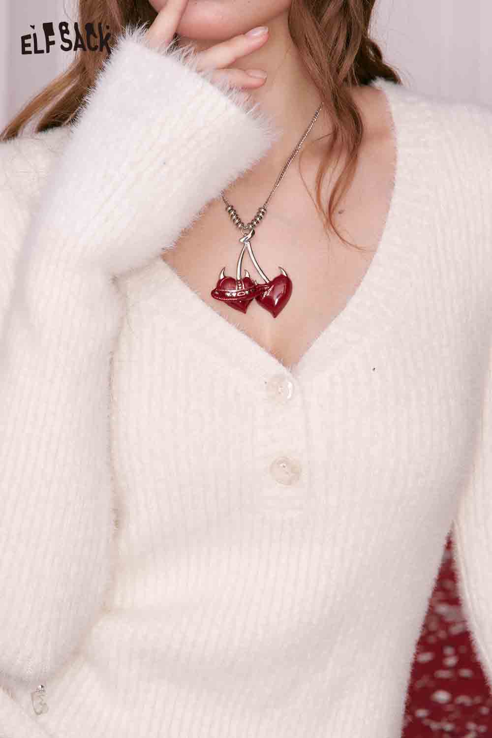 ELFSACK cherry pendant heart necklace worn on a soft white sweater, featuring a stylish design