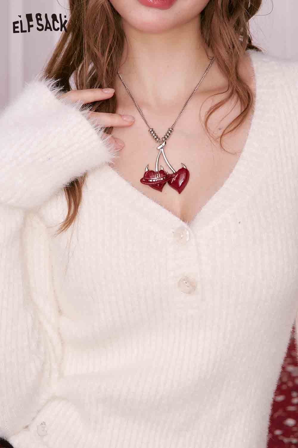 ELFSACK cherry pendant heart necklace worn on a cozy white sweater for a stylish look
