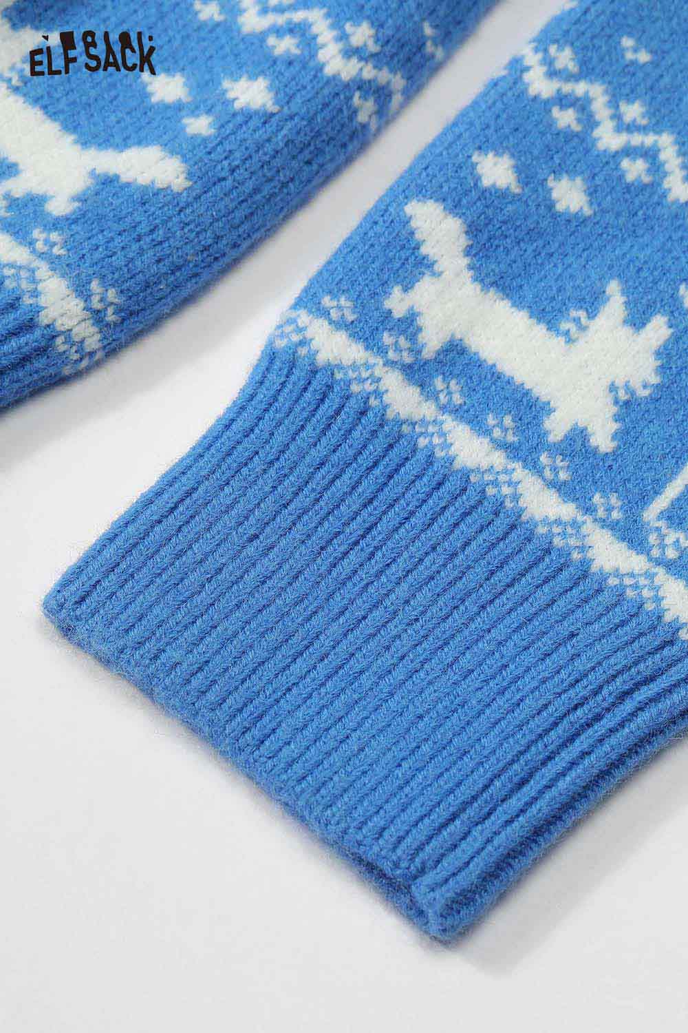 ELFSACK Christmas graphic reversible sweater with festive blue design and cozy knit texture