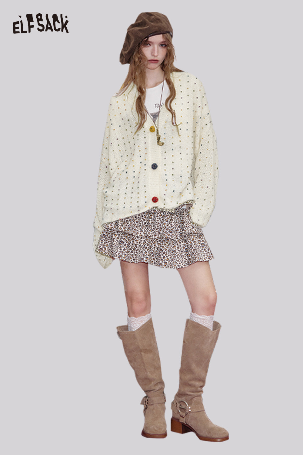 ELFSACK chunky v-neck cardigan for women paired with a leopard print skirt and knee-high boots