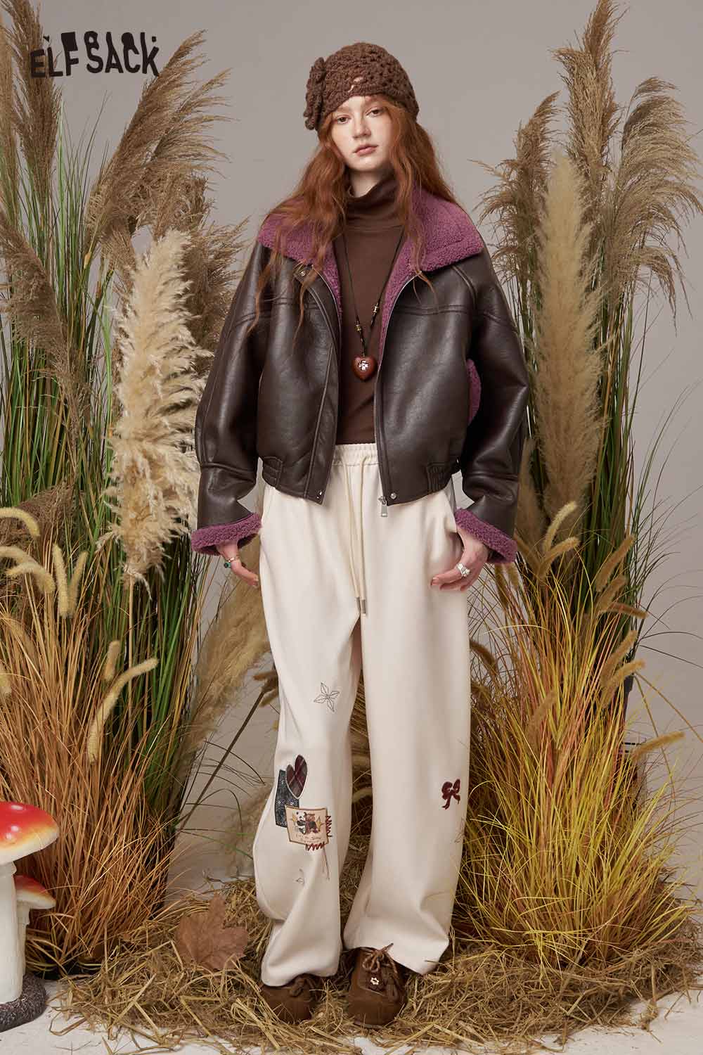 ELFSACK color block faux fur bomber jacket in brown with purple detail, styled with trendy pants