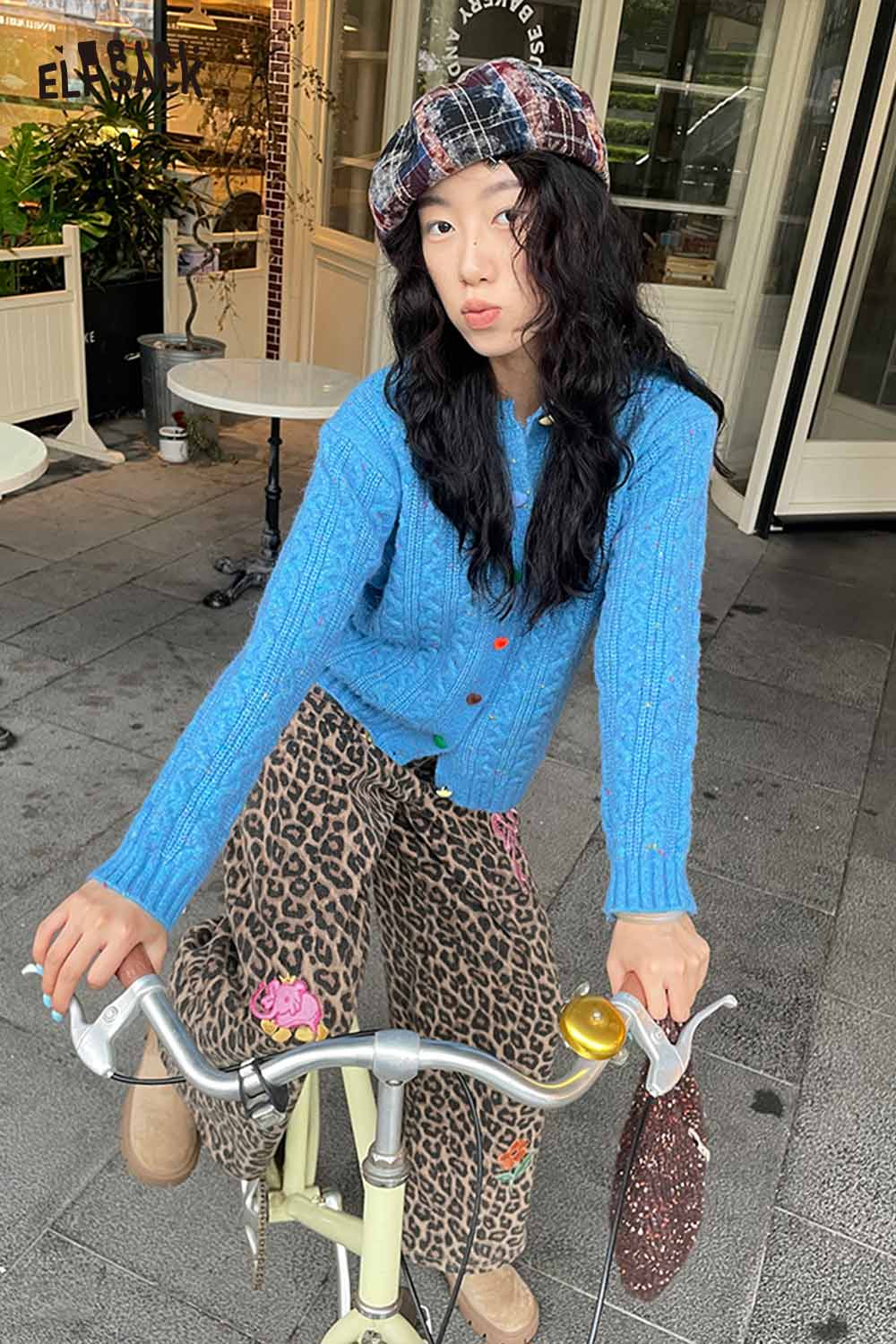 ELFSACK color blocked knitted beret worn with a blue sweater and leopard print pants