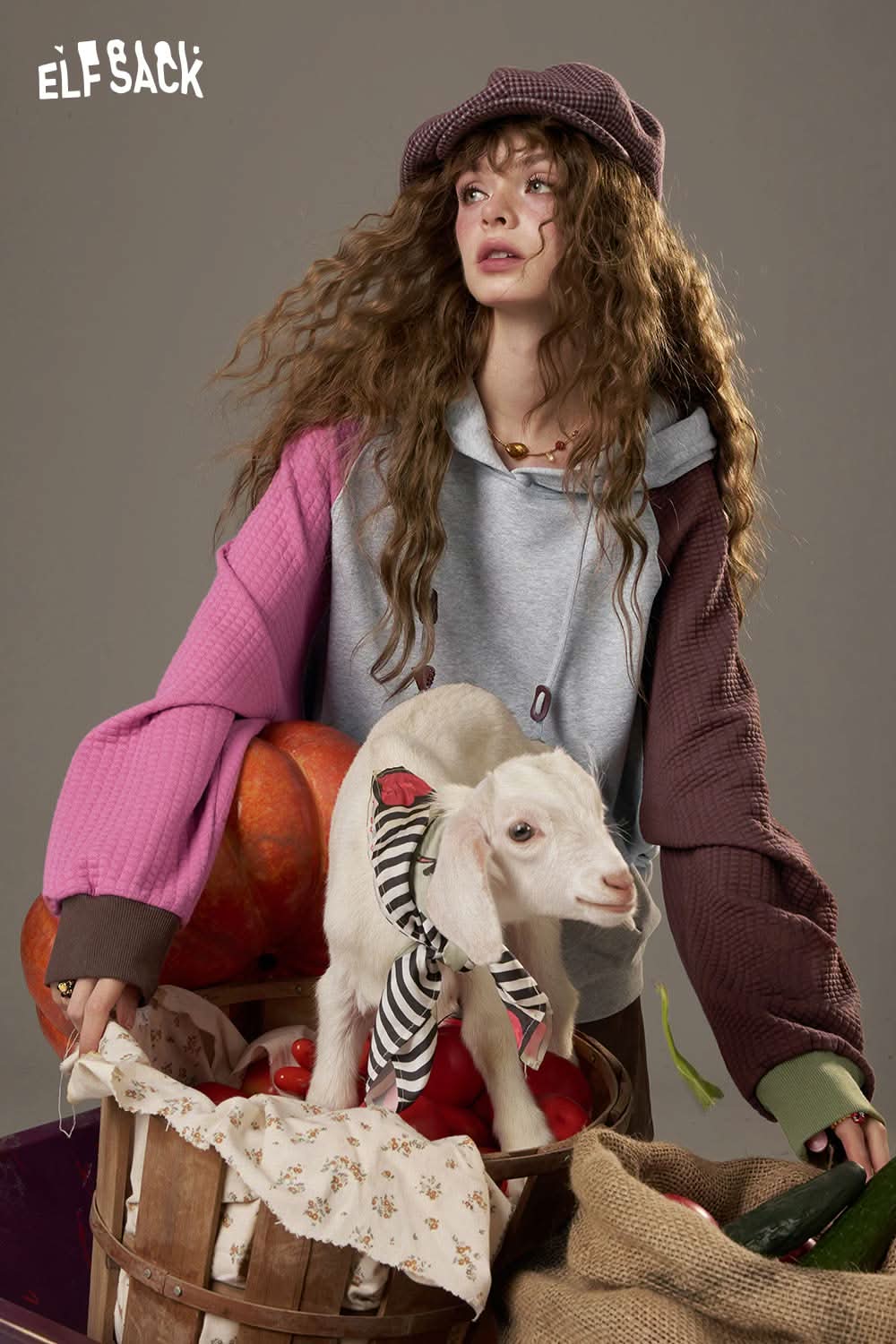 ELFSACK colorblock raglan sleeve sweatshirt in pink and gray with oversized sleeves and a cozy fit