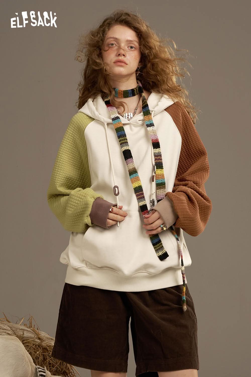 ELFSACK colorblock raglan sleeve sweatshirt featuring diverse textures and a relaxed fit