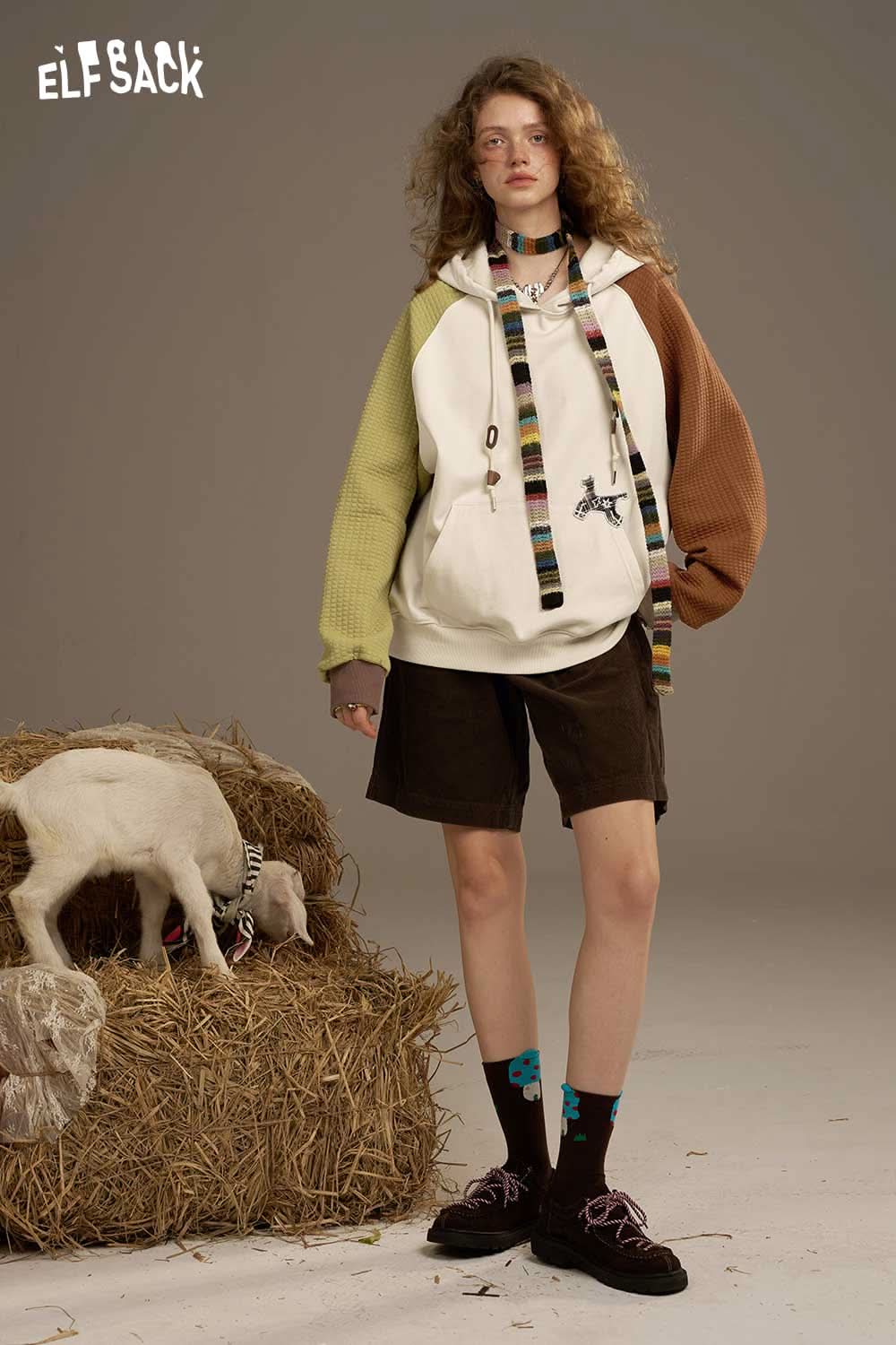 ELFSACK colorblock raglan sleeve sweatshirt featuring a cozy design with a playful look