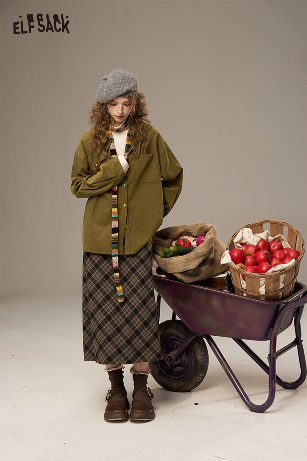 Stylish ELFSACK colorful button pocket shirt for women paired with a plaid skirt