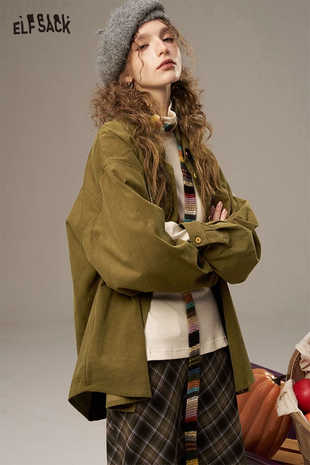 
                  
                    ELFSACK colorful button pocket shirt for women in olive green with a relaxed fit and stylish design
                  
                