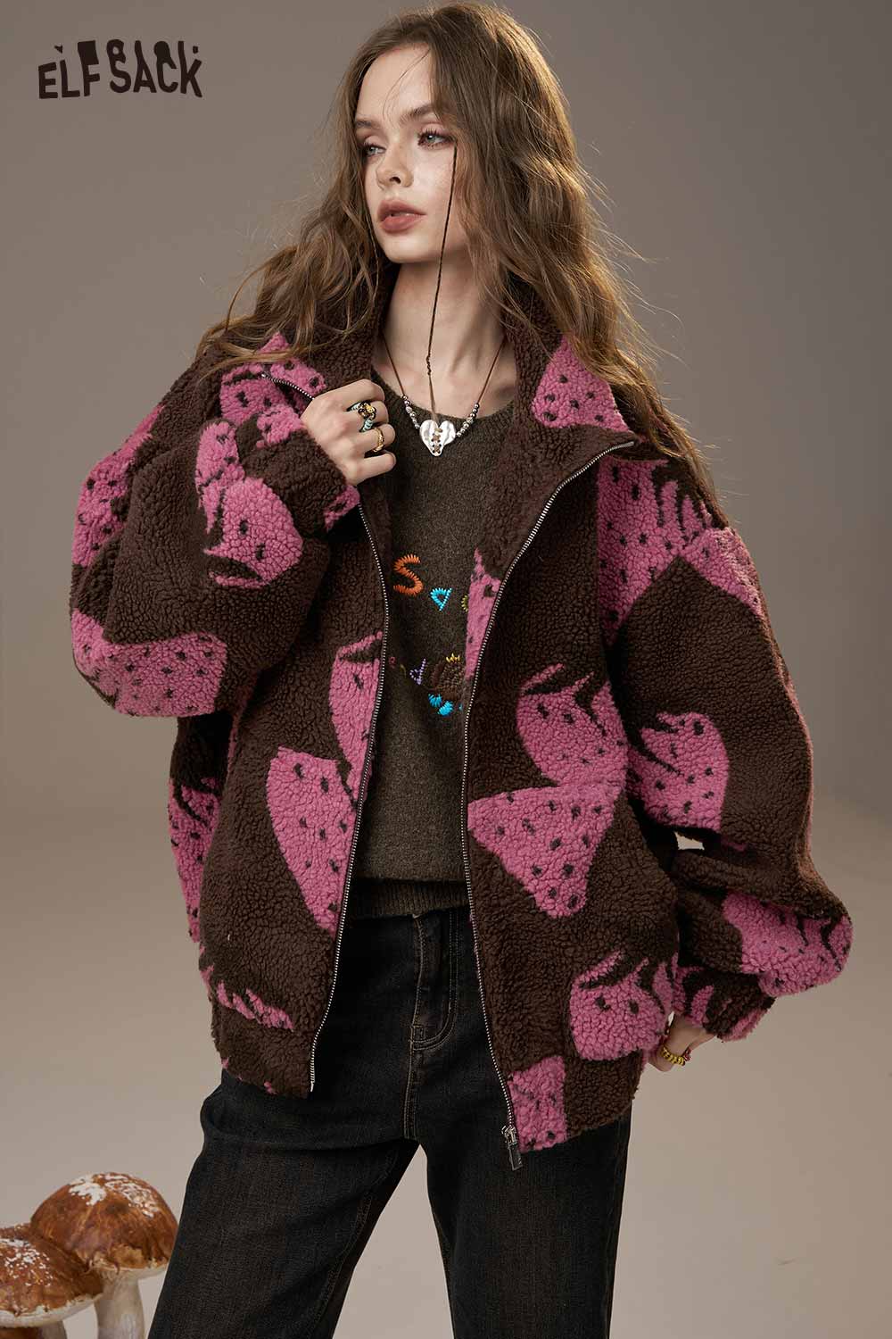 Colorful logo embroidery sweater by ELFSACK with playful designs in pink and brown patterns