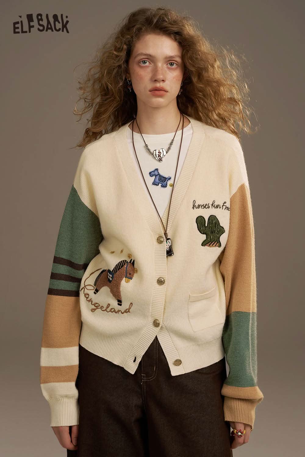 ELFSACK colorful patchwork knitted sweater for women featuring horse and cactus designs on a cream background