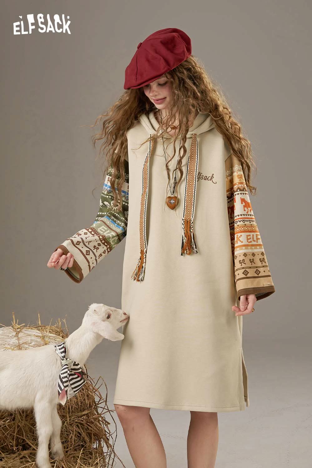 ELFSACK colorful print hooded sweatshirt dress with unique patterns and tassel details