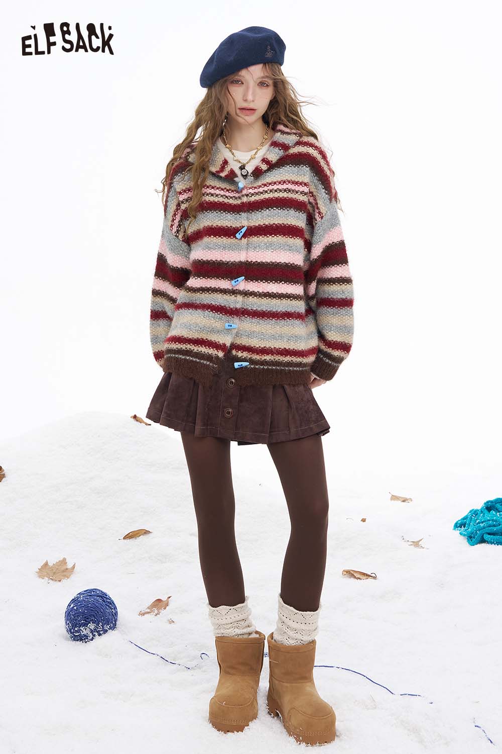 Colorful striped hooded sweater women from ELFSACK with button details and oversized fit