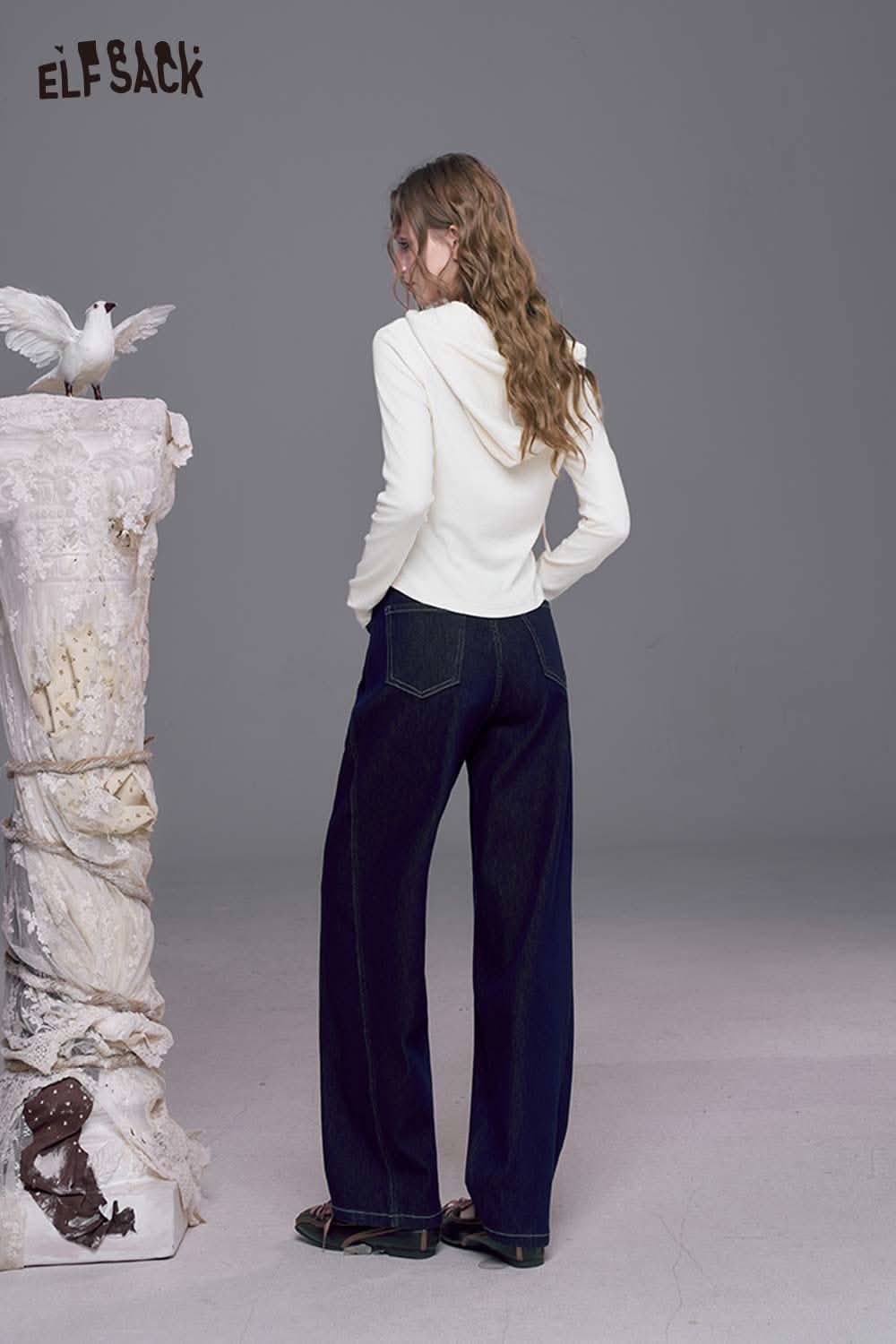 ELFSACK contrast stripe dark wash jeans displayed on model for a stylish urban look.