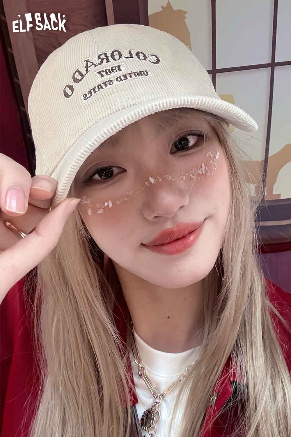 ELFSACK corduroy baseball cap for women in cream featuring a vintage logo design