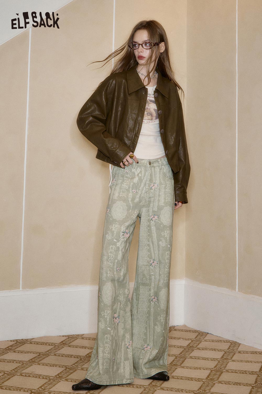 ELFSACK cotton allover print jeans for women in light green featuring a relaxed fit and unique floral patterns