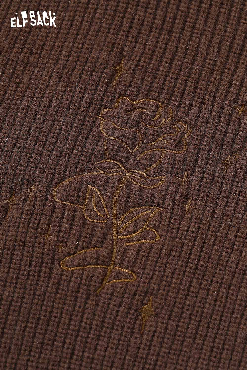 Close-up of ELFSACK cotton blend embroidered zip up sweater featuring a floral design
