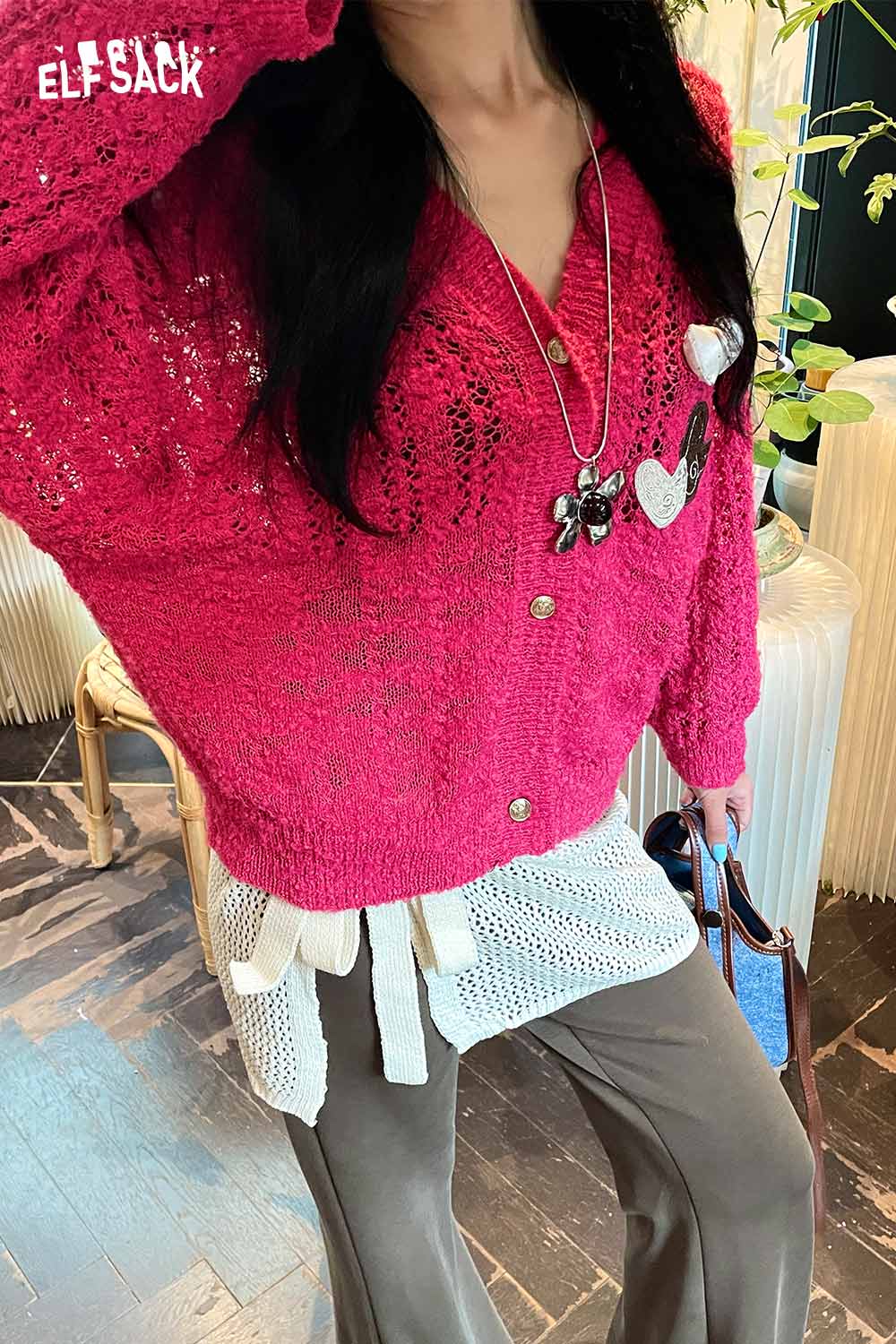 ELFSACK oversized pink sweater worn with a cotton blend knit skirt with apron for a stylish casual look