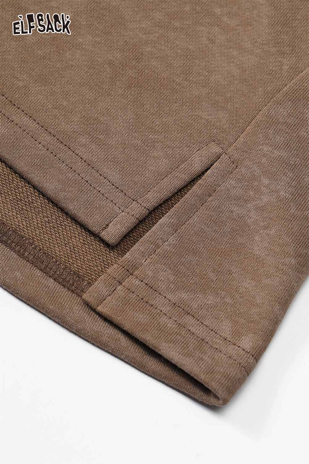 Close-up of the ELFSACK cotton blend stripe hooded dress fabric showcasing its soft texture and stitching details