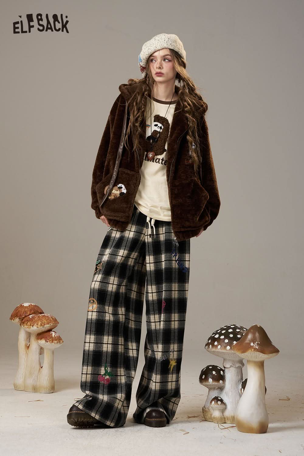 ELFSACK cotton cartoon embroidery long sleeve tee styled with a cozy brown jacket and plaid pants