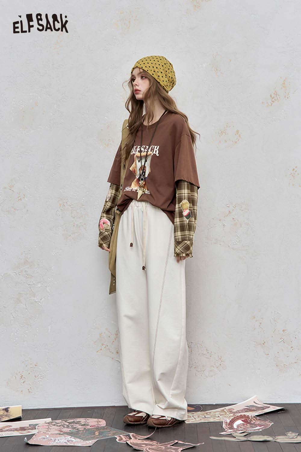 ELFSACK cotton checkered patchwork tee paired with oversized pants and beanie for a trendy look