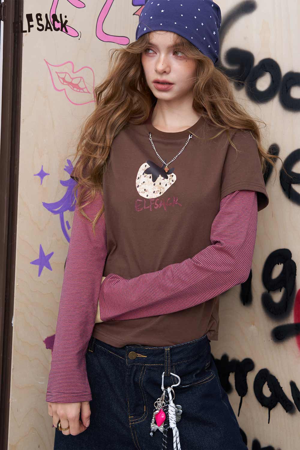 ELFSACK women's fruit print cotton tee brown layered over pink long sleeve styled with bucket hat and jeans