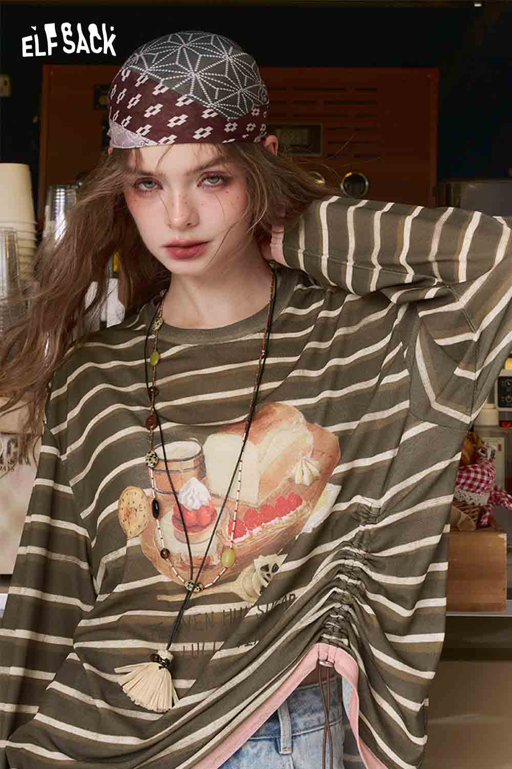 ELFSACK model wearing relaxed fit ruched stripe t-shirt with hamburger print and side drawstring