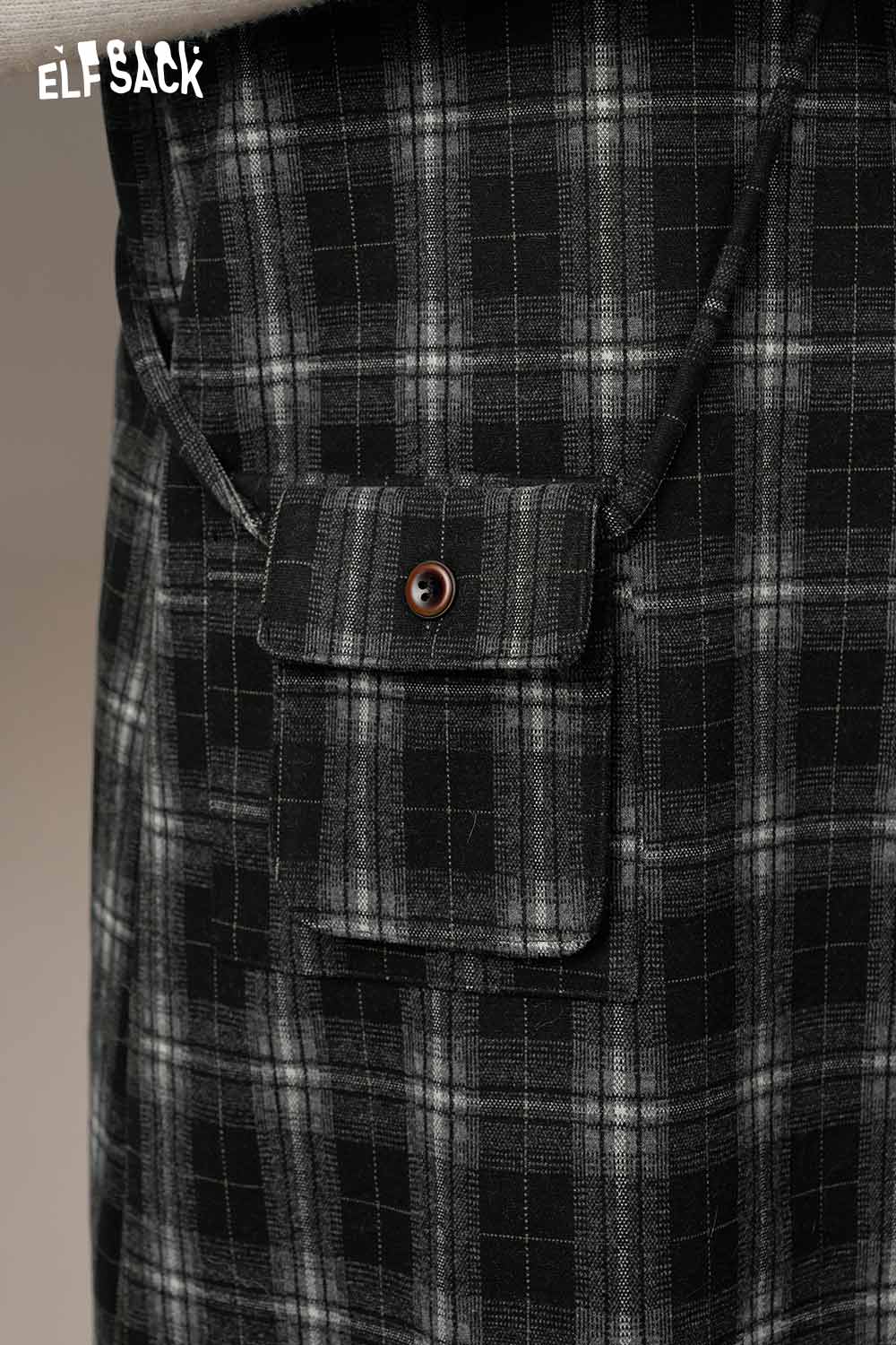 Close-up of ELFSACK cotton plaid loose fit dress featuring a stylish pocket detail