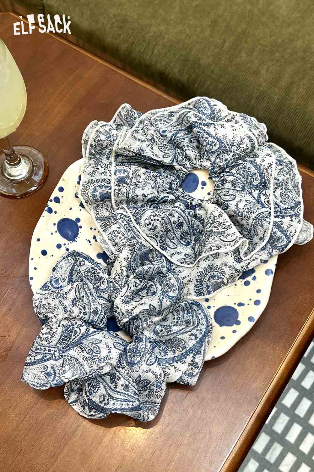 ELFSACK bohemian paisley hair tie set with blue and white oversized scrunchie and bow on wooden table