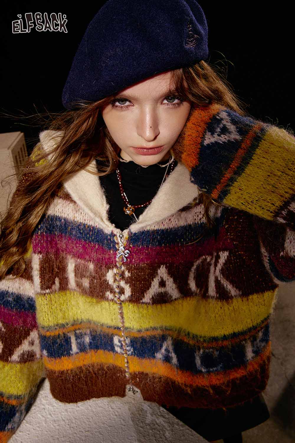 Trendy ELFSACK cropped knit sweater for women in colorful stripes with a cozy, stylish design