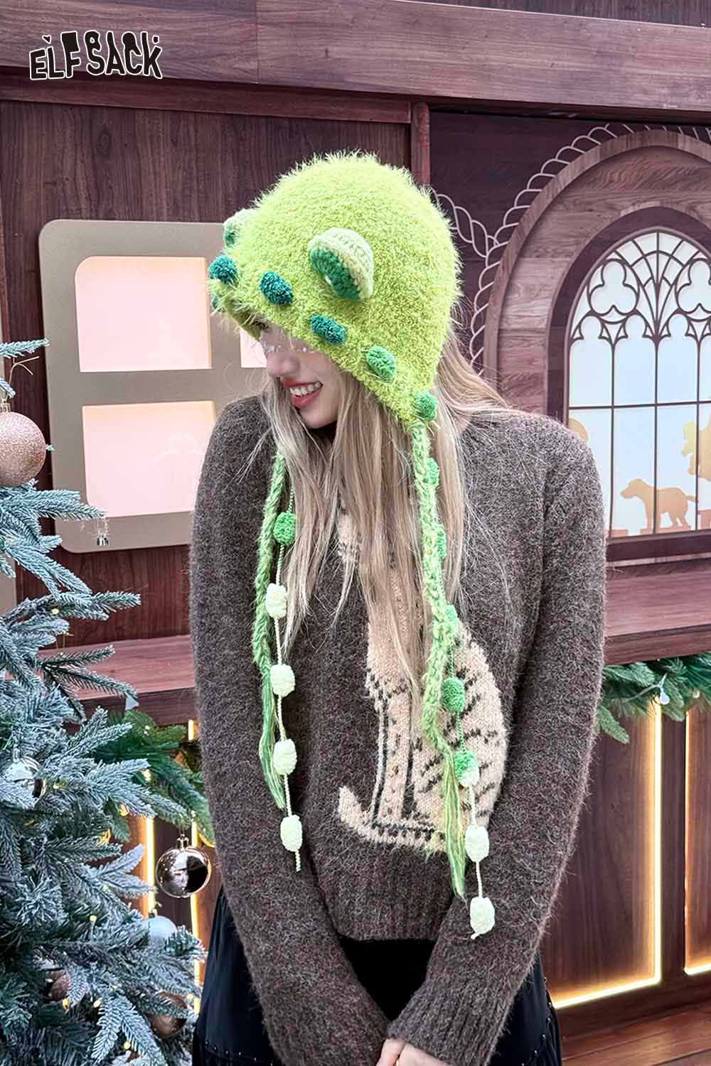 Woman wearing a cute 3D ear beanie hat in vibrant green with playful accents and long ties