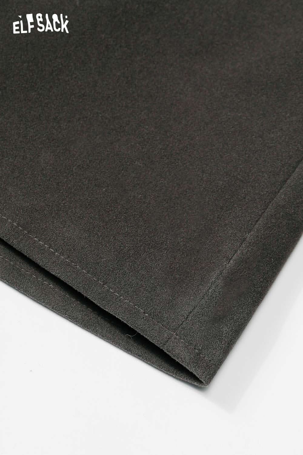 Close-up of ELFSACK denim A-line mini skirt showcasing smooth fabric and quality stitching