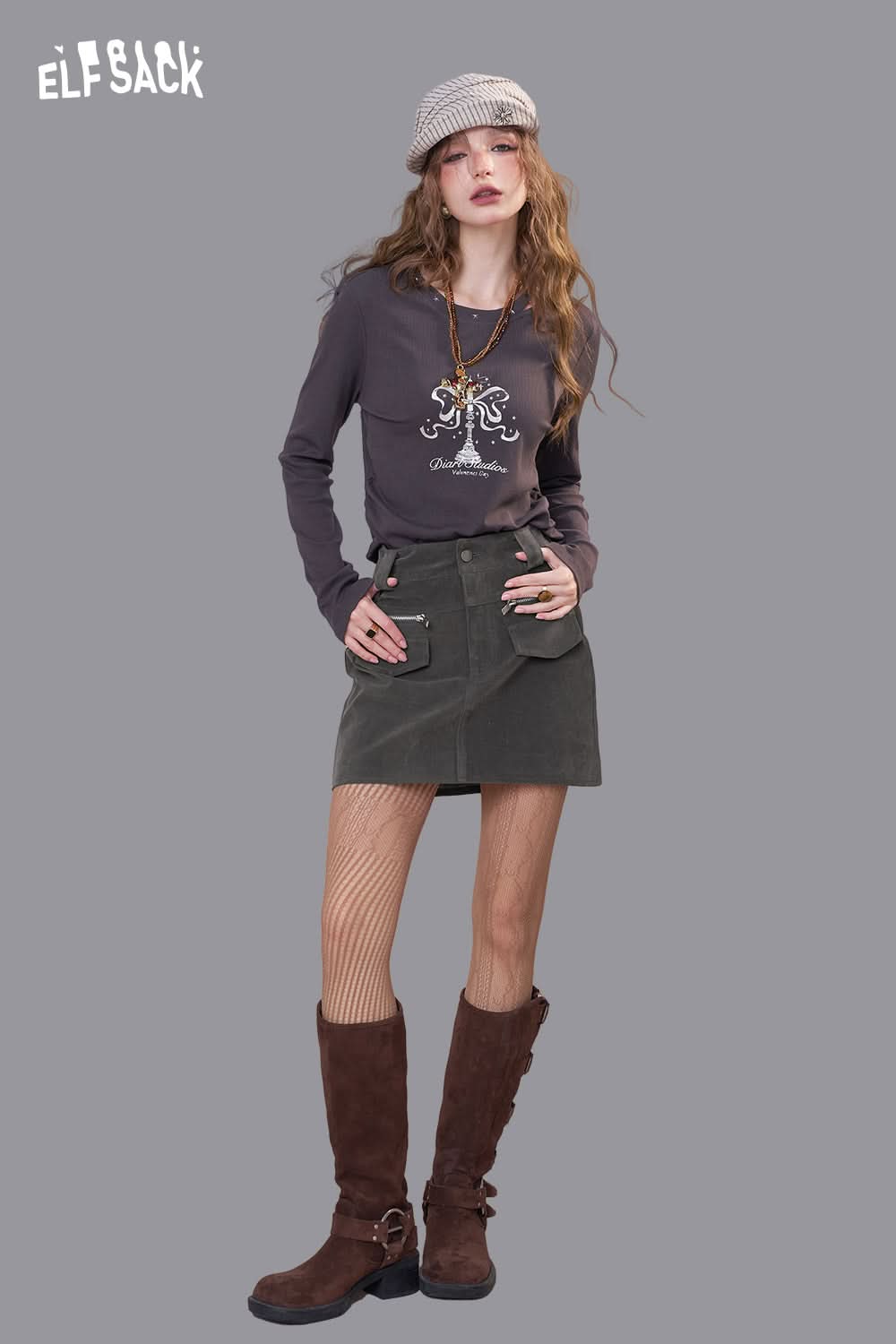 ELFSACK stylish model wearing a denim A-line mini skirt paired with a graphic top and trendy accessories