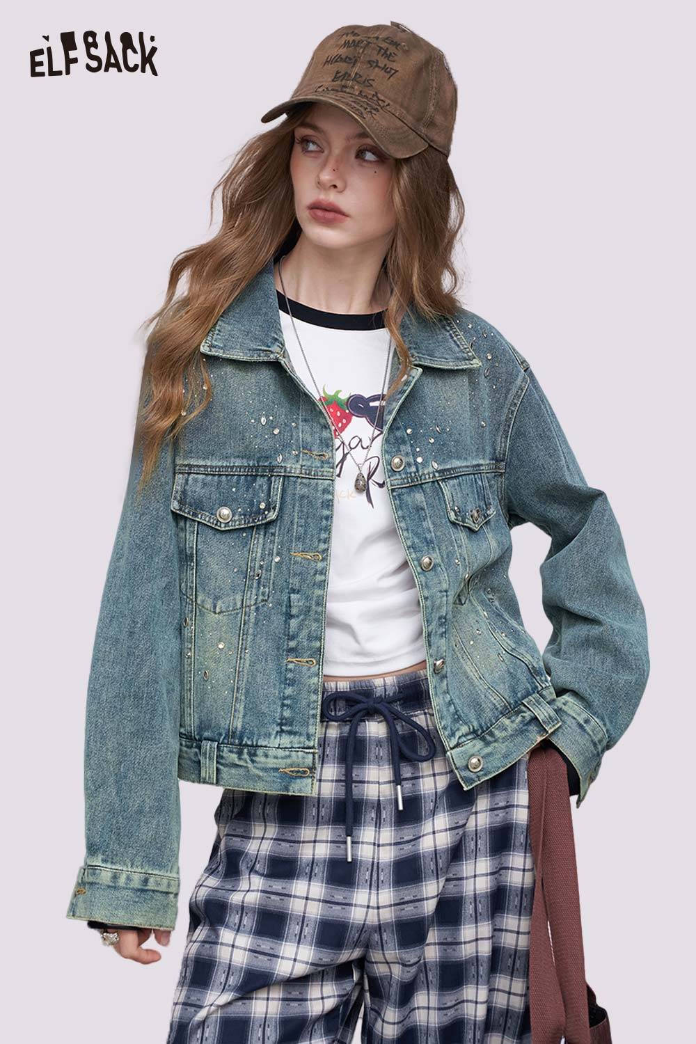 ELFSACK women's diamond embellished denim jacket styled with graphic tee plaid pants and brown cap