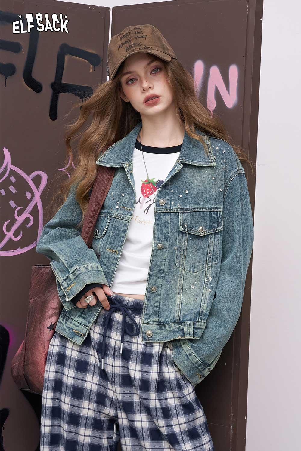 ELFSACK women's diamond embellished denim jacket on model with plaid pants and baseball cap