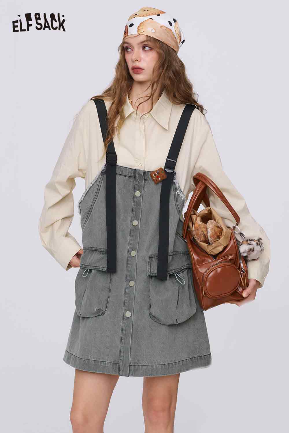 ELFSACK denim color-block midi dress with oversized pockets and black suspenders paired with beige shirt and headscarf