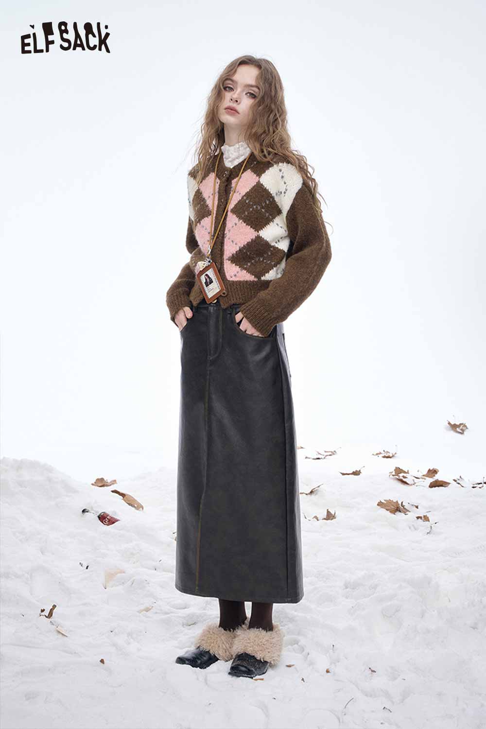ELFSACK diamond graphic cropped sweater in brown and pastel colors, styled with a long leather skirt