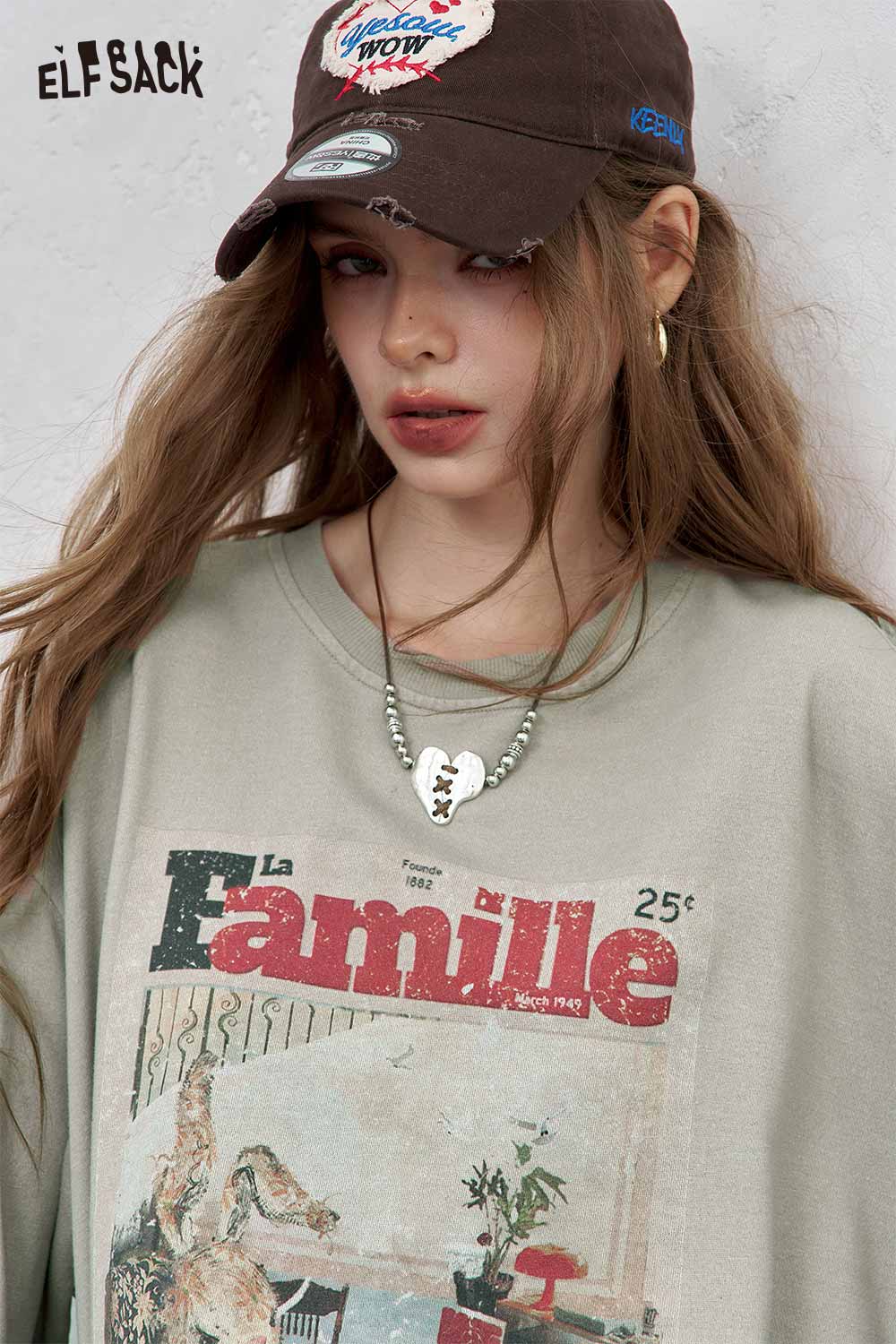 ELFSACK distressed cotton jersey long sleeve tee featuring a vintage graphic design for casual style