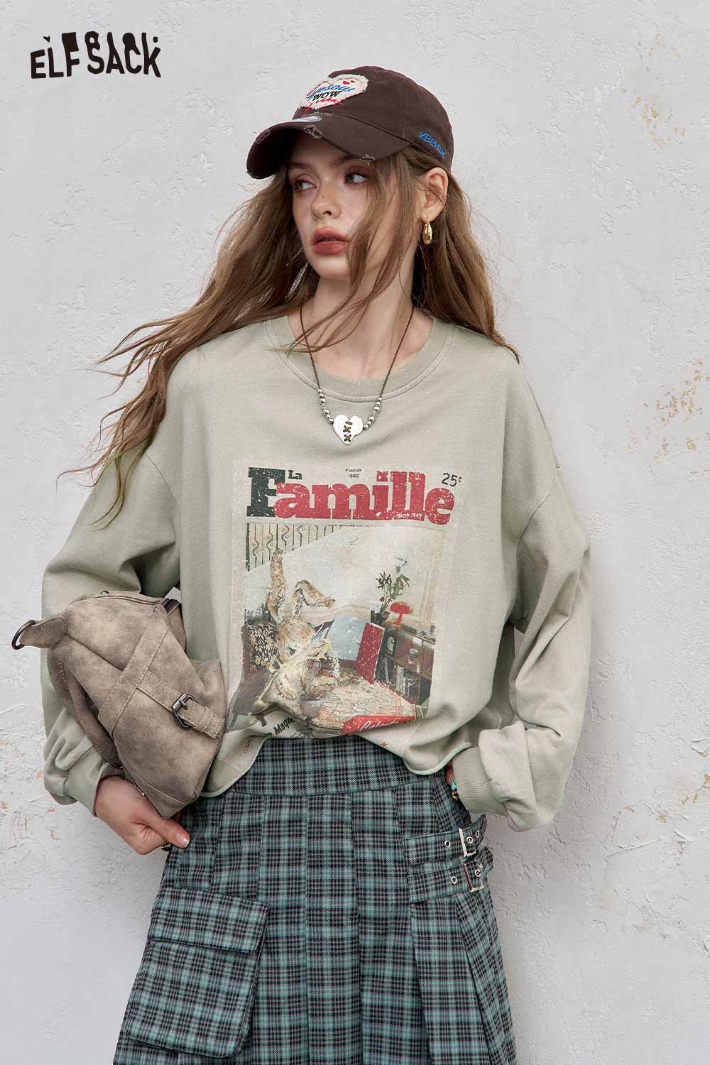 ELFSACK distressed cotton jersey long sleeve tee featuring a vintage graphic design and relaxed fit
