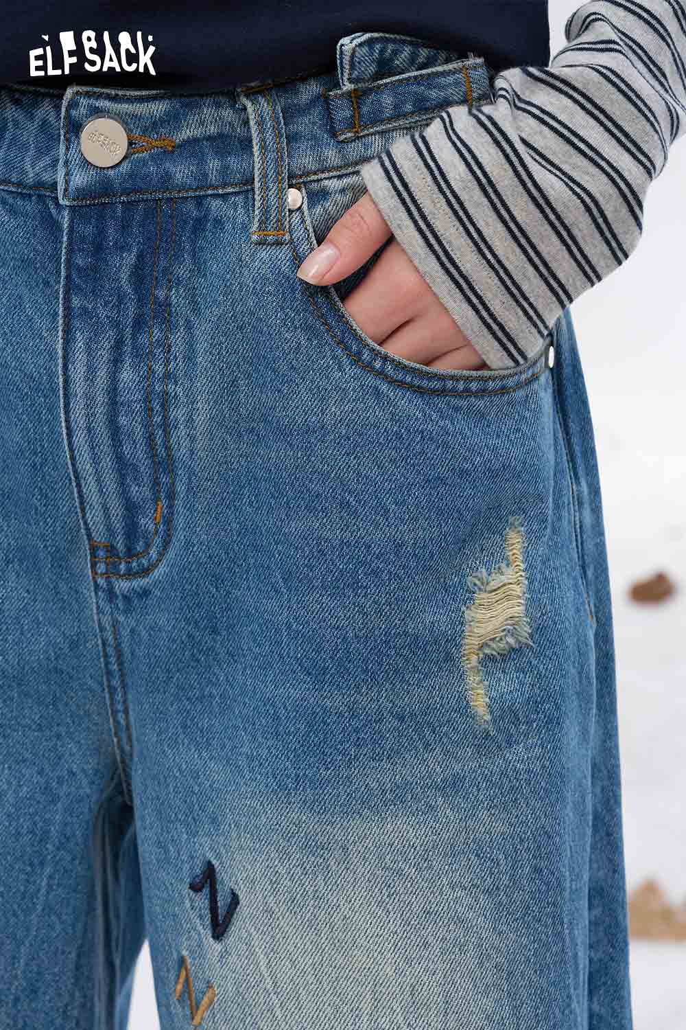 ELFSACK dog graphic distressed jeans featuring a relaxed fit and unique vintage details