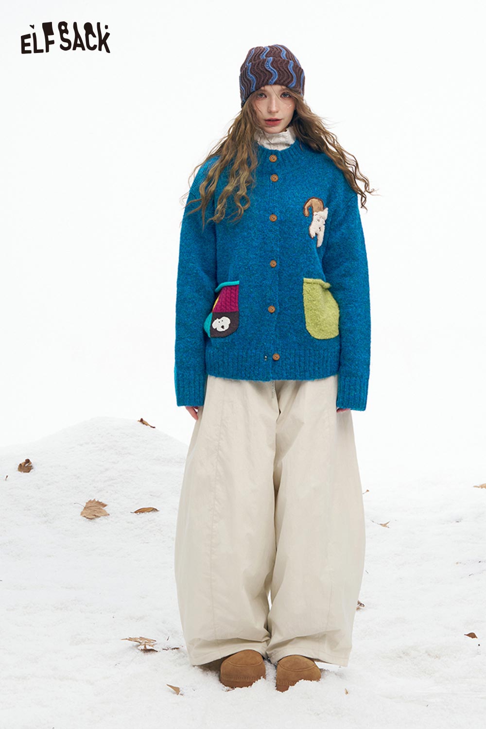 ELFSACK dog graphic sweater for women in blue featuring colorful pockets and a cozy design