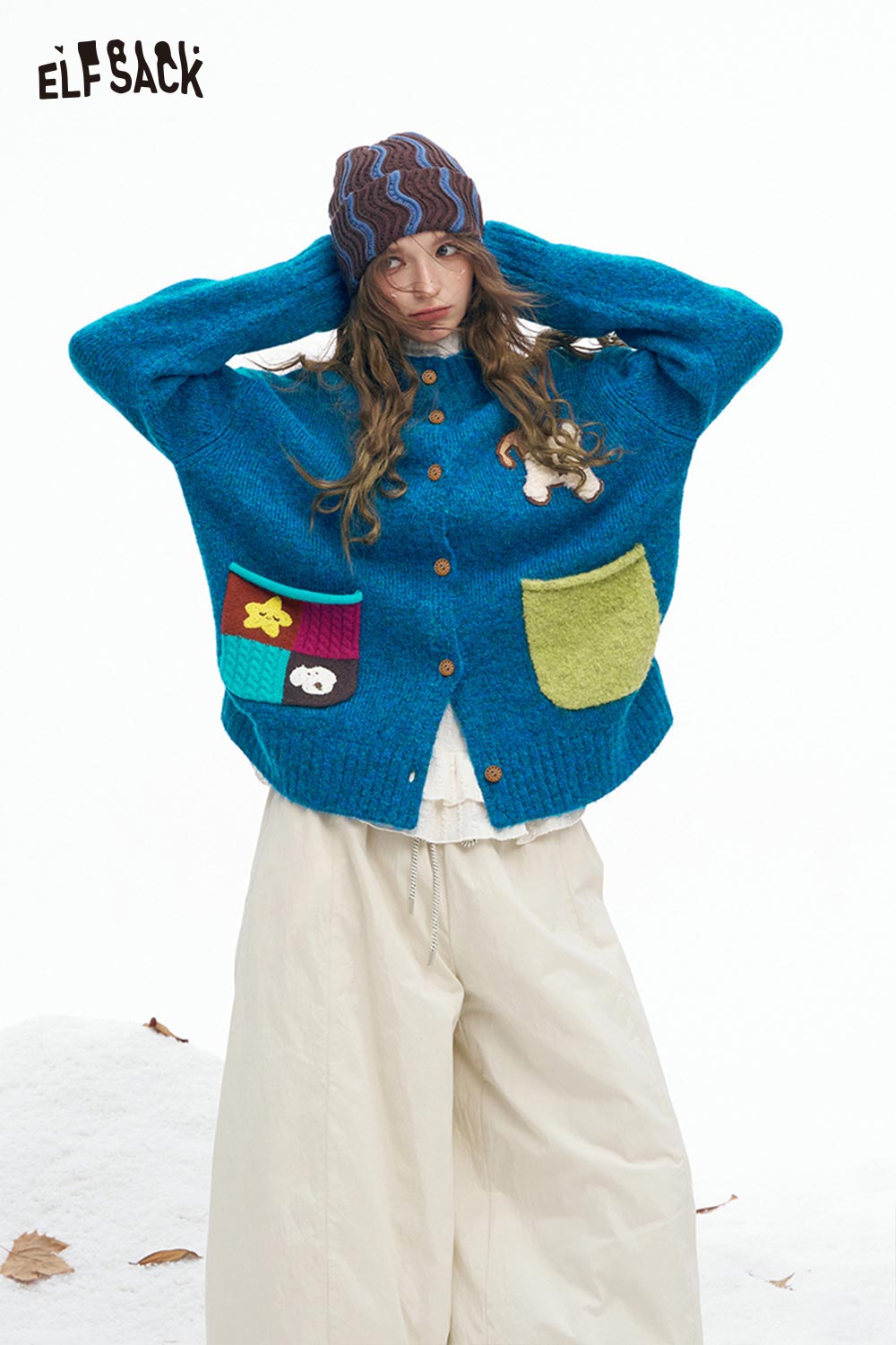 ELFSACK dog graphic sweater for women in blue with colorful pockets for a fun and cozy look