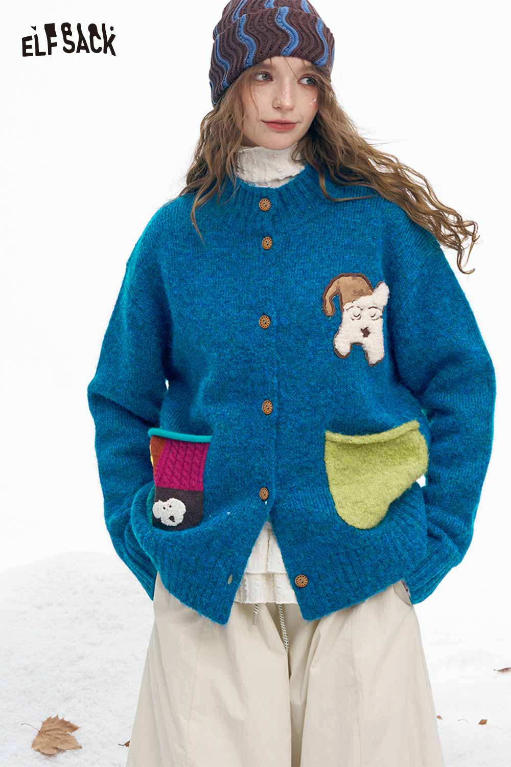 ELFSACK dog graphic sweater for women in blue with colorful pockets and button details