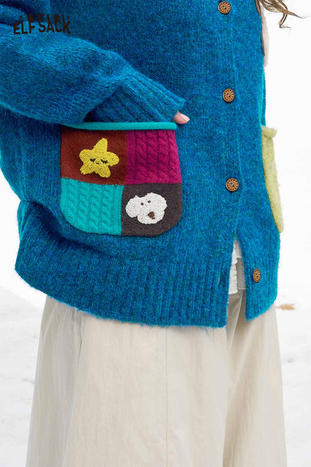 ELFSACK dog graphic sweater for women featuring colorful patch pockets and a cozy design