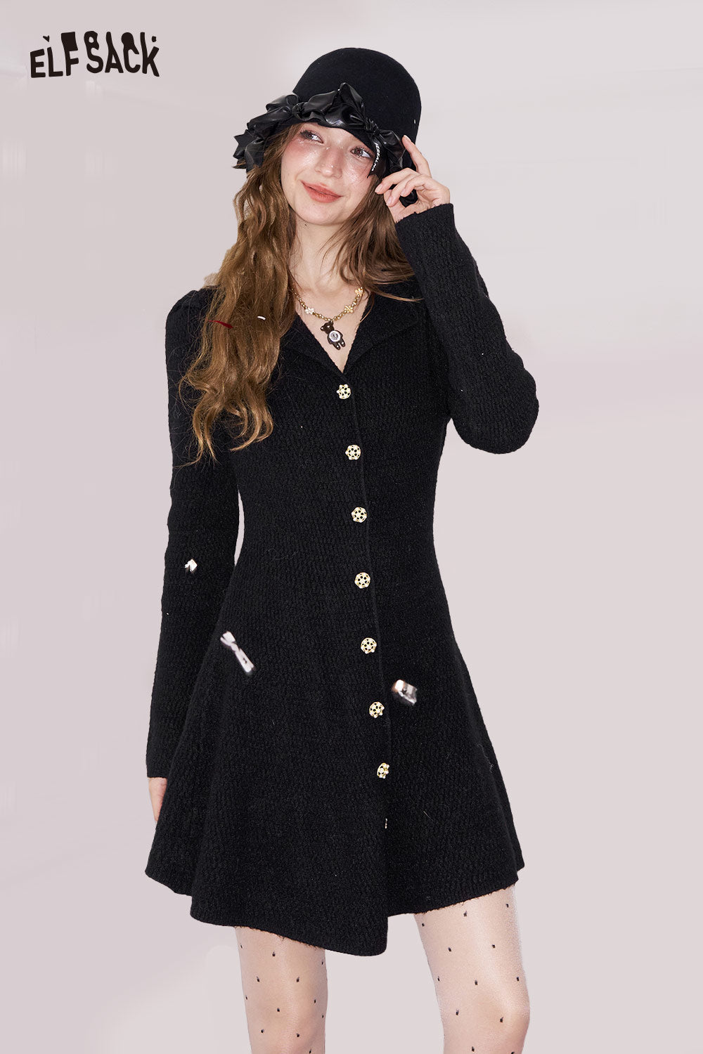 ELFSACK elegant gold button dress in black with a flared skirt and full sleeves