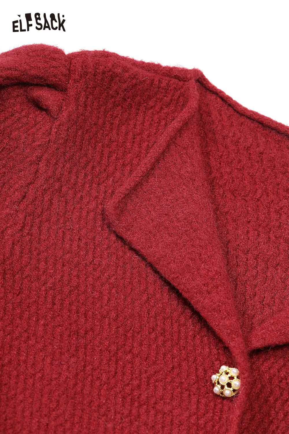 Close-up of ELFSACK elegant gold button dress featuring textured fabric and a stylish collar