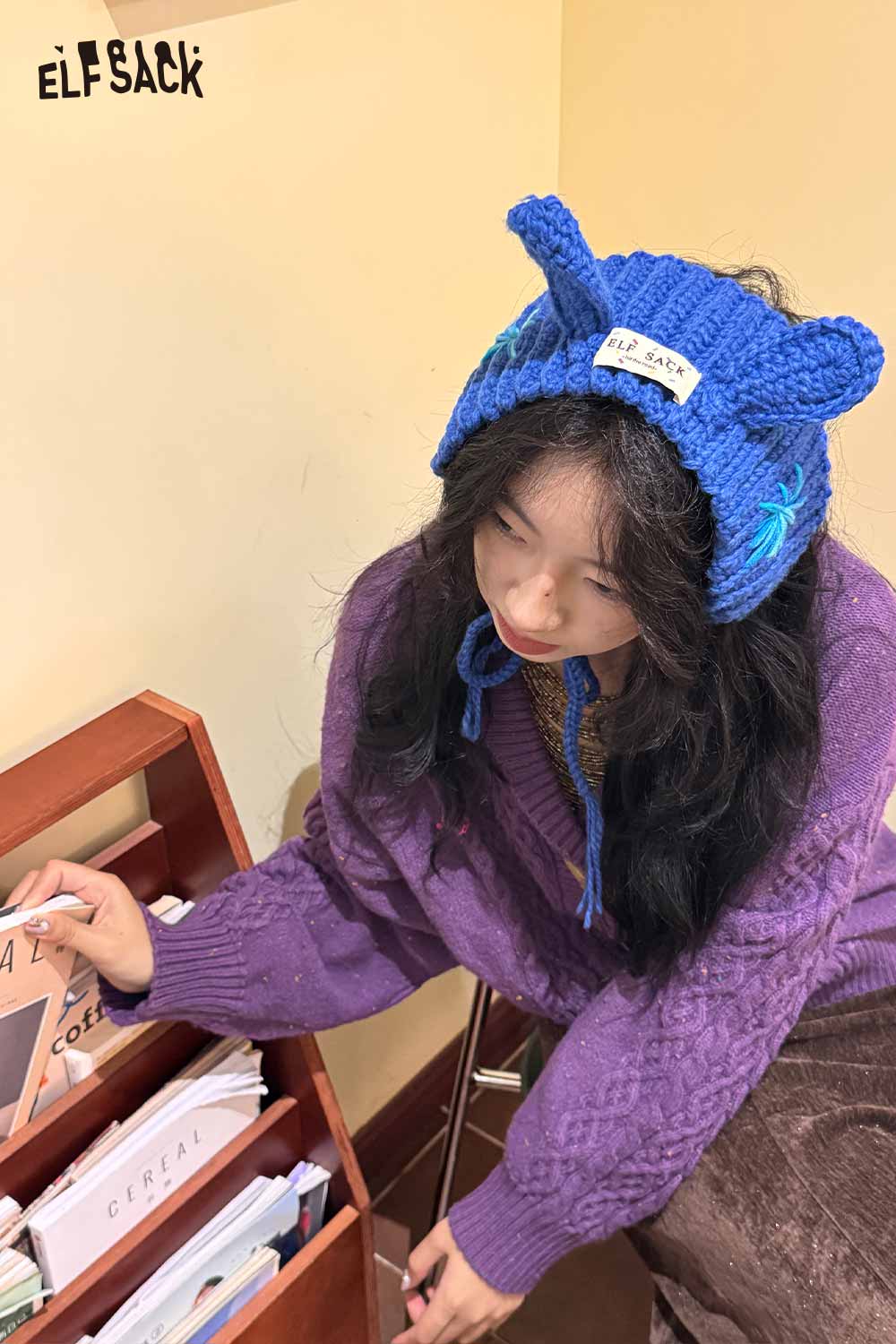 ELFSACK 3D bunny ear knit ear warmers in blue with playful design for cozy winter wear